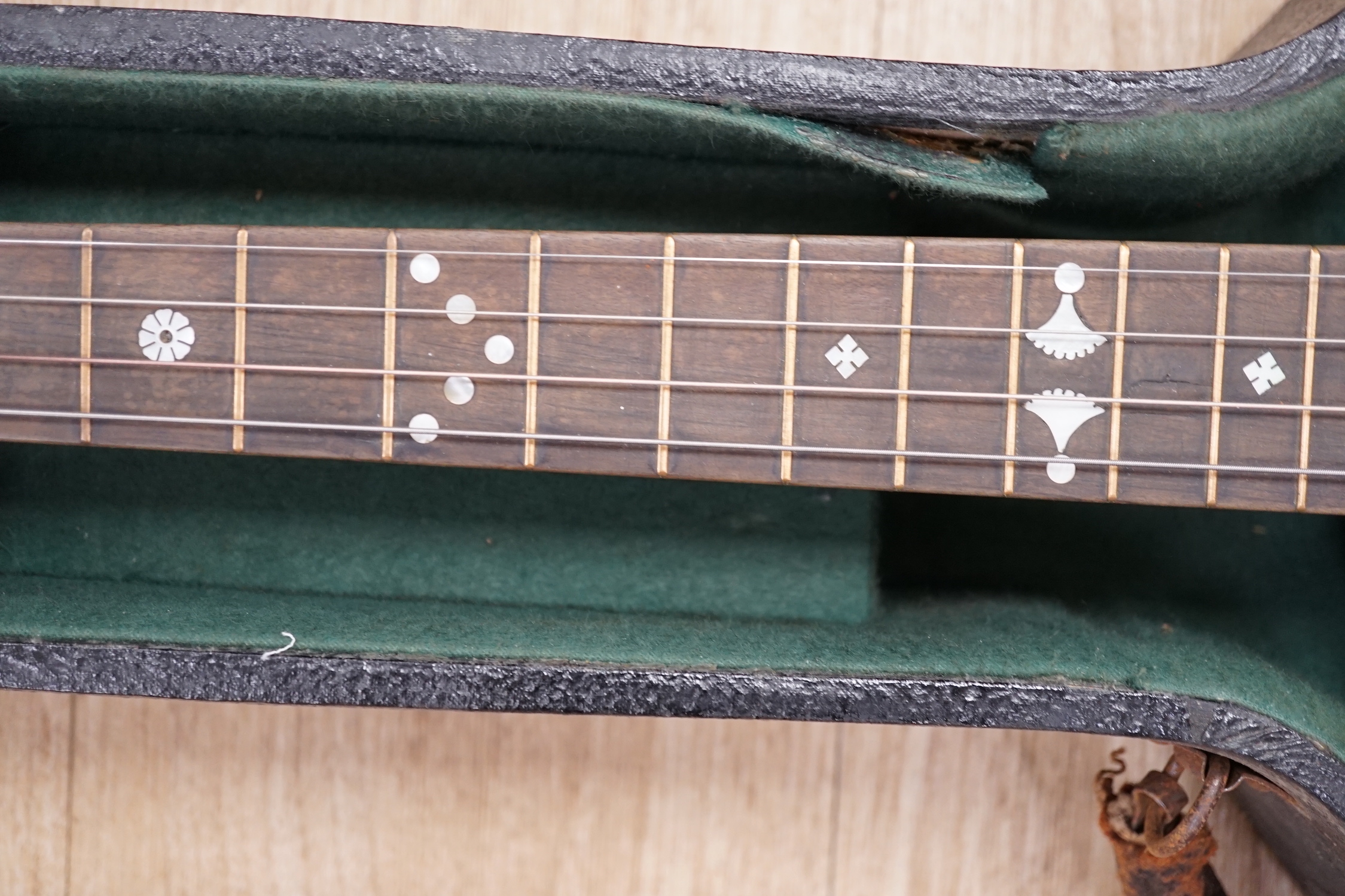 A cased English 1930s Windsor Whirl four string tenor banjo, mother of pearl inlaid neck, length of body 33cm, overall length 84cm, in fitted case